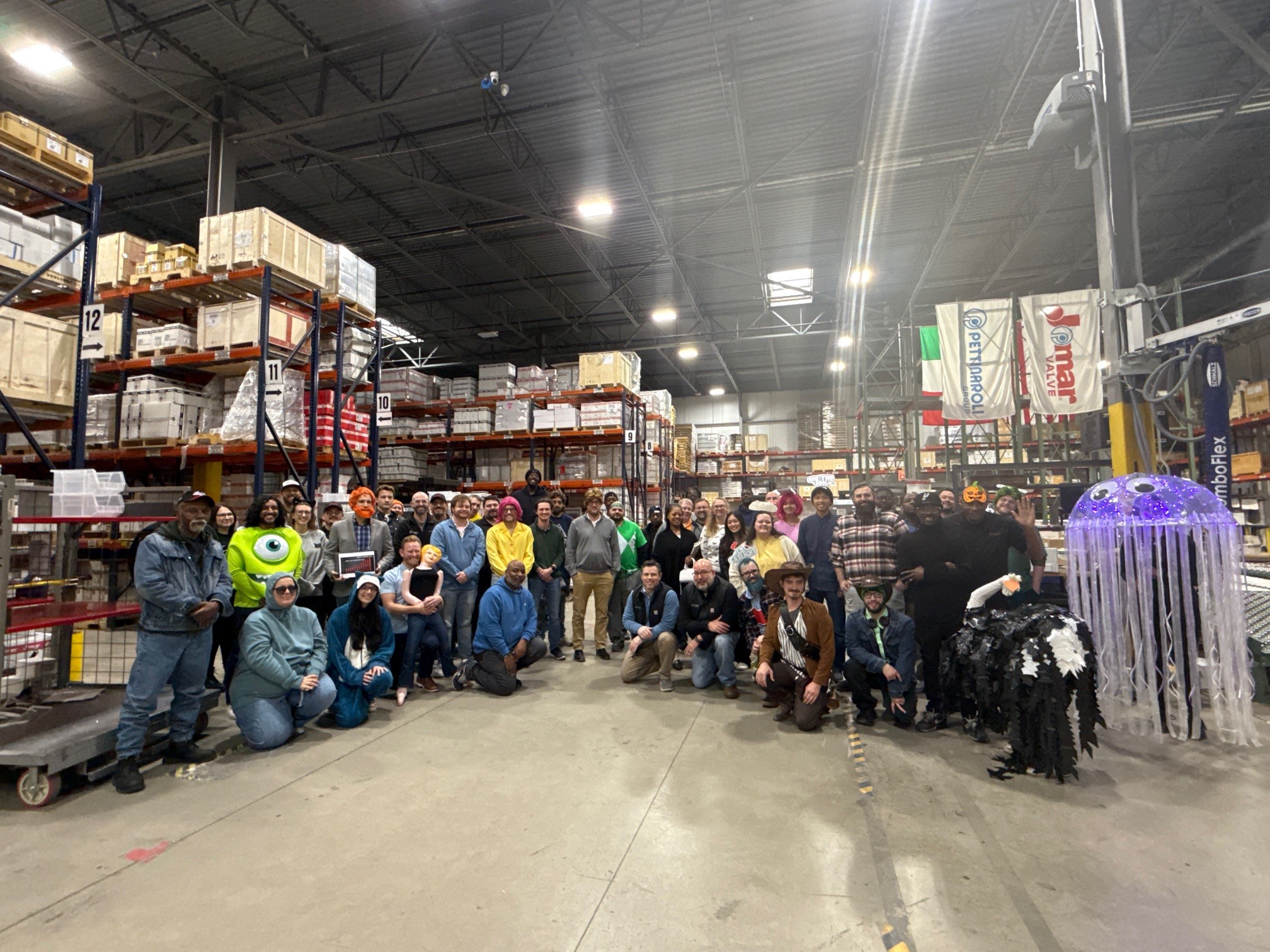 group of people dressed up in Halloween costumes